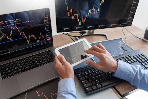 Trader checking forex market signals and charts.